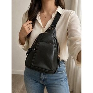 Crossover Bag By Urban Expressions In Black Leather and Black Ajustable Strap.